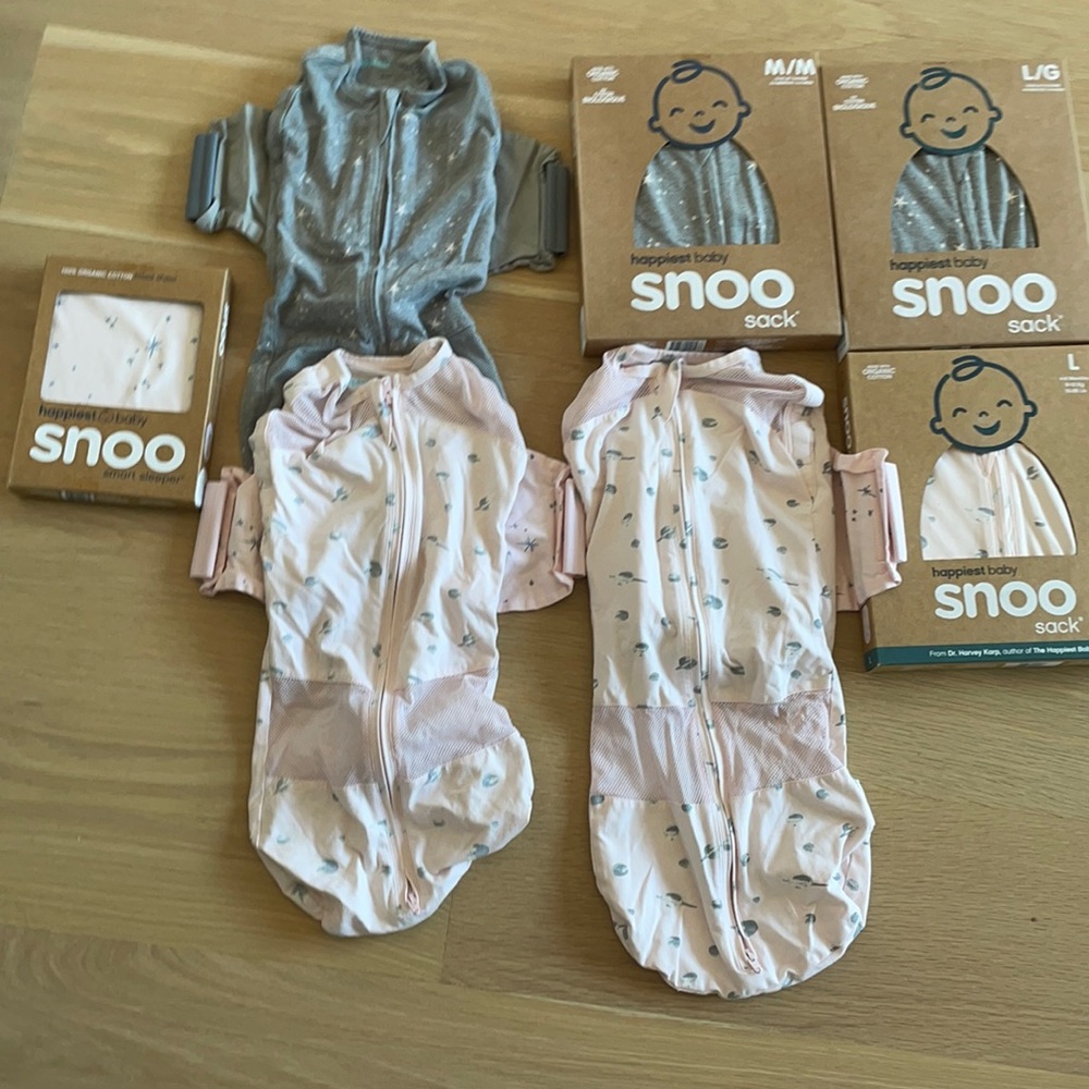 Snoo sleep sacks and fitted sheet. NWT 7 items total